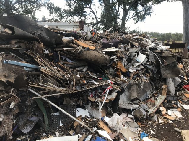 Illegally dumped waste on Eagleby property