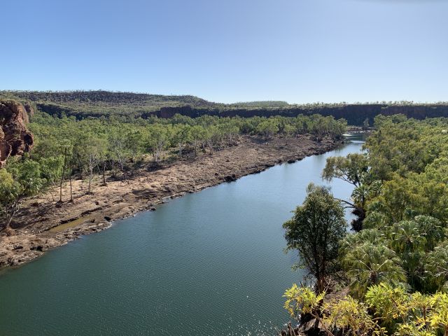 Photo of the river where flooding stripped vegetation from the banks.