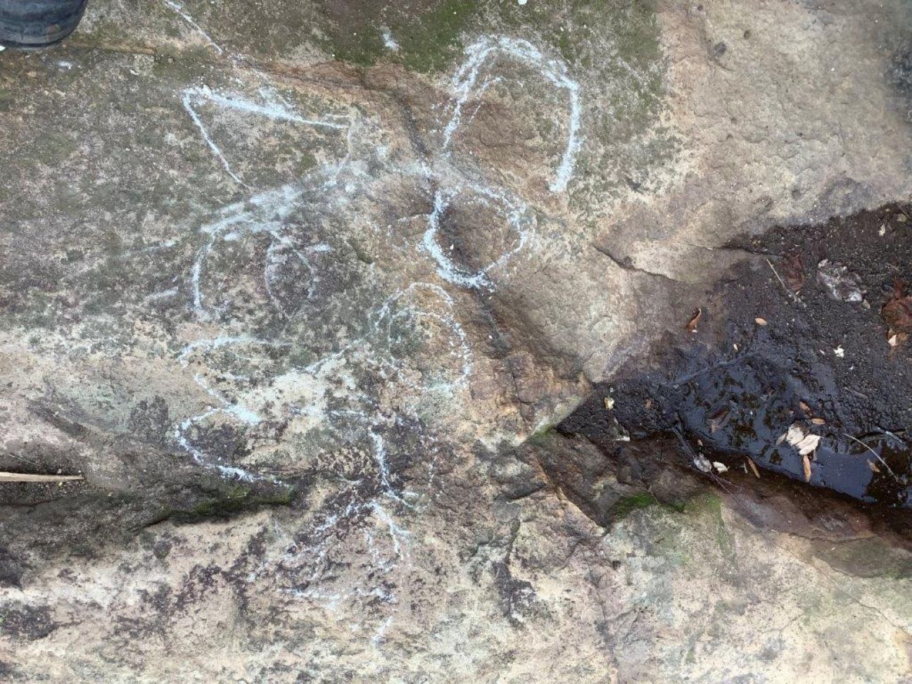 Graffiti drawings on rock surface at Mount Ngugun
