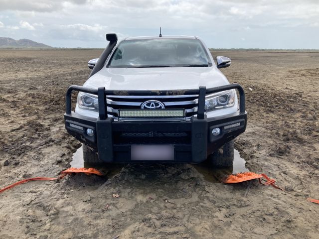Photo of a vehicle trapped on saltpan.