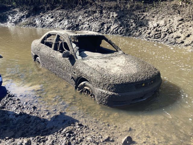 Rangers had to remove this barnacle covered car from the reserve.