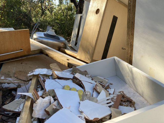 Photo of dumped kitchen discovered by rangers in April. A thorough investigation has led to two fines being issued.
